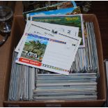 A BOX OF ASSORTED VINTAGE POSTCARDS