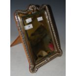 A BIRMINGHAM SILVER MOUNTED DRESSING TABLE MIRROR WITH BEVELLED MIRROR PLATE