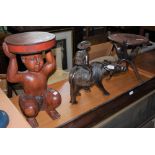 A GROUP OF THREE WOODEN CARVINGS INCLUDING AN INDONESIAN CARVED STOOL IN THE FORM OF A BOY, A