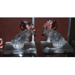 A PAIR OF LALIQUE CLEAR AND FROSTED GLASS BOOKENDS, EACH MODELLED WITH THE HEAD OF A COCKEREL WITH