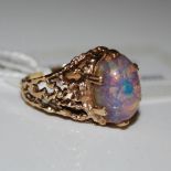 A 9CT GOLD AND OPAL DRESS RING, RING SIZE P, GROSS WEIGHT 6.1 GRAMS