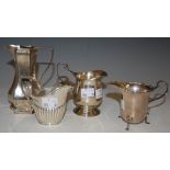 A COLLECTION OF FOUR ASSORTED SILVER CREAM JUGS, THREE WITH SHEFFIELD MARKS, ONE WITH EDINBURGH