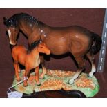 A BESWICK FIGURE GROUP OF HORSE AND FOAL