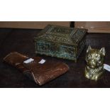 A LATE VICTORIAN BRASS INKWELL MODELLED IN THE FORM OF A DOGS HEAD, TOGETHER WITH A RECTANGULAR
