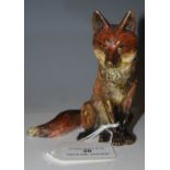 AN EARLY 20TH CENTURY AUSTRIAN COLD PAINTED BRONZE MODEL OF A SEATED FOX, STAMPED MARKS, 9.5CM HIGH
