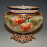 A HADLEY'S WORCESTER FOOTED BOWL, WITH HAND PAINTED DECORATION OF ROSES AND FOLIAGE WITH PIERCED