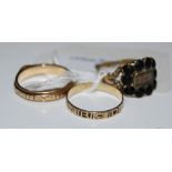 TWO YELLOW METAL MOURNING RINGS, ONE WITH WOVEN HAIR PANEL, THE OTHER INSCRIBED 'DIED 28TH JAN