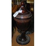 A BRONZED REGENCY STYLE GOBLET AND COVER WITH GREEK KEY DETAIL, 33CM HIGH