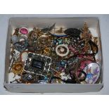 A BOX OF ASSORTED COSTUME JEWELLERY, BROOCHES, BANGLES, THIMBLES ETC.