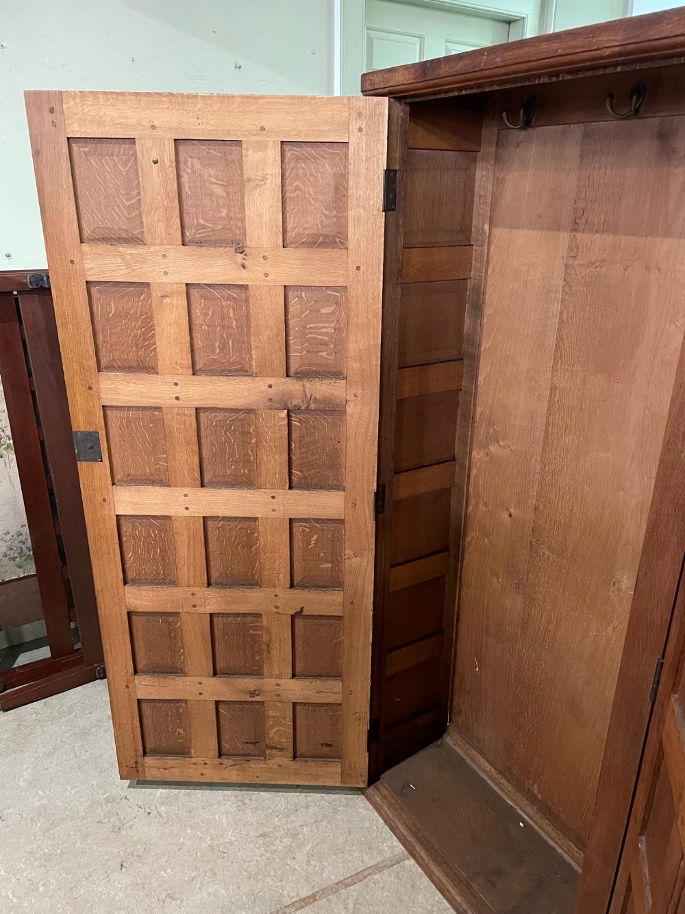 EARLY 20TH CENTURY OAK PANELLED DOUBLE WARDROBE IN THE MANNER OF THE COTSWOLD SCHOOL, THE TWO - Image 7 of 7