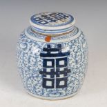 A Chinese porcelain blue and white jar and cover, Qing Dynasty, decorated with shou characters on