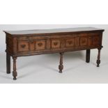A 17th / 18th century oak dresser, the rectangular plank top above three frieze drawers, raised on