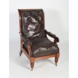 A 19th century carved rosewood and leather upholstered metamorphic armchair, the curved