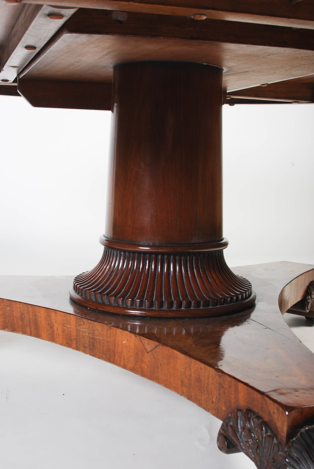 A large 19th century mahogany snap top dining table, the hinged circular top on a plain column - Image 4 of 5