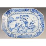 A Chinese blue and white porcelain octagonal shaped meat plate, Qing Dynasty, decorated with figures