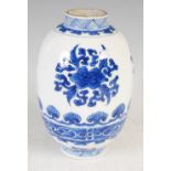 A Chinese porcelain blue and white jar, Qing Dynasty, decorated with three roundels of peony and