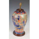 A Chinese porcelain blue and white vase with clobbered decoration converted to a table lamp, overall