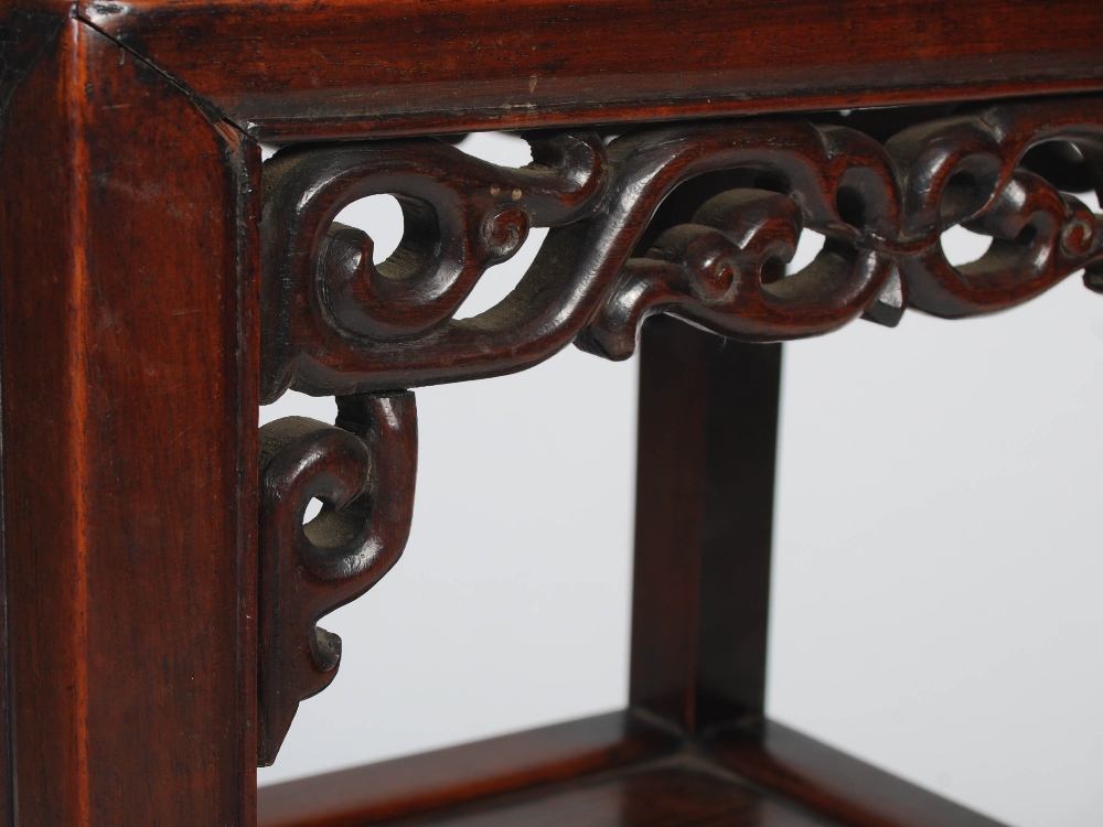 A Chinese darkwood urn stand, Qing Dynasty, the plain top with a carved scrolling frieze with - Image 5 of 6