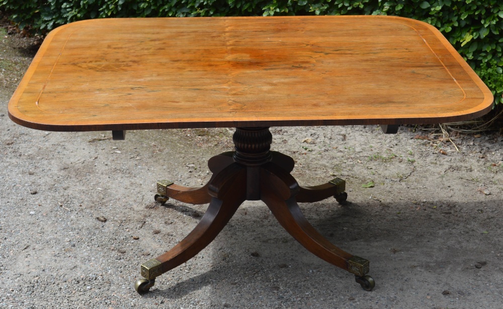 A 19th century rosewood snap top supper table, the hinged rounded rectangular top on a cylindrical - Image 2 of 5