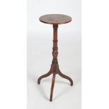 A 19th century Georgian style mahogany wine / occasional table, the round top on a tripod base