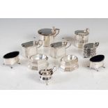 A collection of silver cruets, various dates and makers, to include; a pair of octagonal salts,
