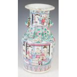 A Chinese porcelain famille rose Canton vase, Qing Dynasty, decorated with rectangular shaped panels