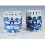 A pair of Chinese porcelain blue and white brush pots, Qing Dynasty,