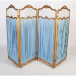 A late 19th / early 20th century French glazed giltwood four section room divider / screen, of
