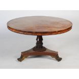 A 19th century rosewood breakfast table, plain round veneered top with beaded rim over a turned