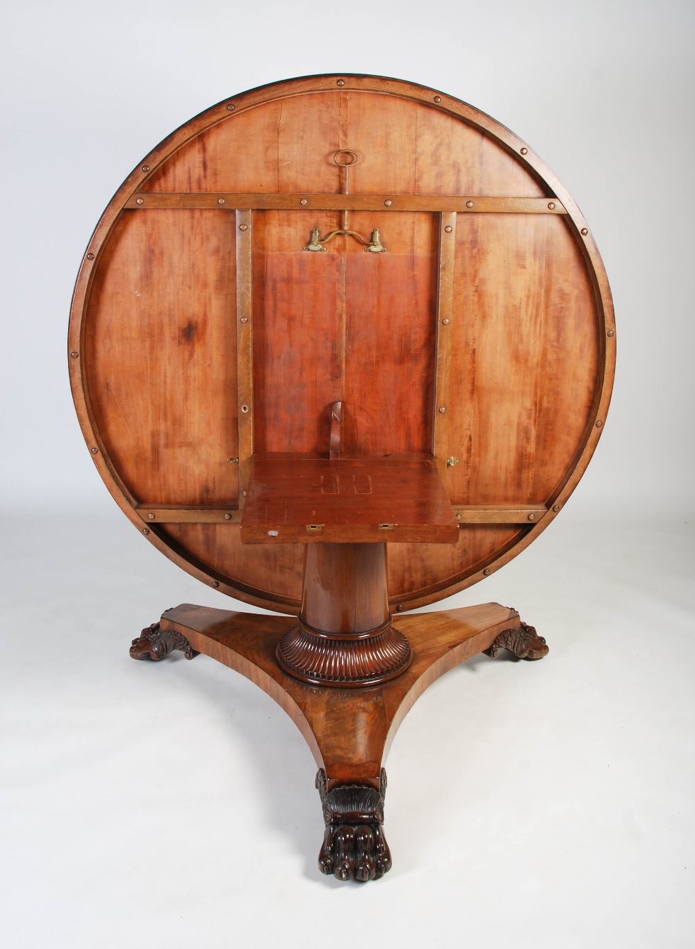 A large 19th century mahogany snap top dining table, the hinged circular top on a plain column - Image 5 of 5