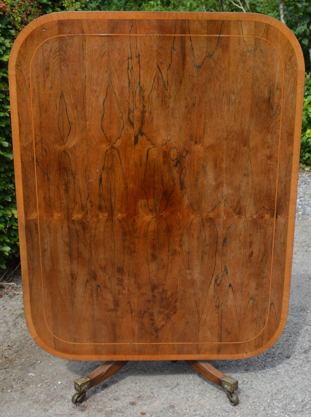 A 19th century rosewood snap top supper table, the hinged rounded rectangular top on a cylindrical - Image 3 of 5