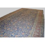 A late 19th / early 20th century Sultanabad carpet, the rectangular blue ground field with all-