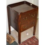 A George III mahogany commode, converted to accommodate two cockbeaded drawers, raised on four