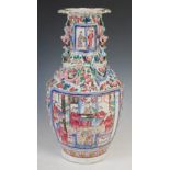 A Chinese porcelain famille rose Canton vase, Qing Dynasty, decorated with rectangular shaped panels