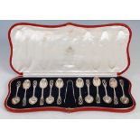 A cased set of George V silver teaspoons and sugar tongs, Edinburgh, 1916, makers mark of Hamilton &