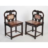 A pair of Chinese carved hardwood, mother of pearl inlaid and marble mounted chairs, late 19th/