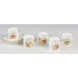 Five Royal Worcester coffee cans and four saucers decorated with game birds by James Stinton, to