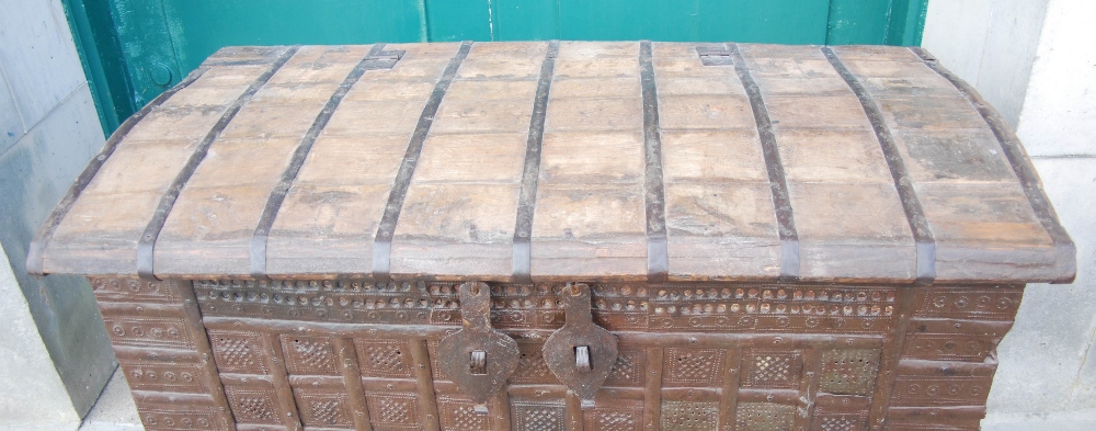 A late 19th/ early 20th century Indian pine and metal bound dowry chest, the domed hinged cover - Image 2 of 10