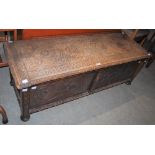 A LATE 19TH / EARLY 20TH CENTURY CARVED OAK COFFER