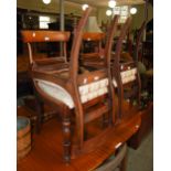 A SET OF FOUR 19TH CENTURY MAHOGANY DINING CHAIRS WITH DROP IN UPHOLSTERED SEATS