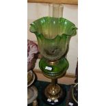 BRASS ART NOUVEAU STYLE PARAFFIN BURNING OIL LAMP WITH GREEN AND CLEAR GLASS RESERVOIR, GREEN AND