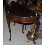 EARLY 20TH CENTURY MAHOGANY DEMILUNE CARD TABLE WITH GREEN BAIZE-LINED INTERIOR