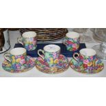 SIX ROYAL WINTON CHINTZ DECORATED SAUCERS TOGETHER WITH FIVE MATCHING CUPS AND A BOXED AYNSLEY