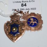 A 9CT GOLD AND BLUE ENAMEL MEDALLION, TOGETHER WITH ANOTHER YELLOW METAL AND BLUE ENAMEL