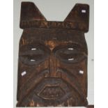 TRIBAL ART - AN AFRICAN CARVED WOODEN WALL MASK