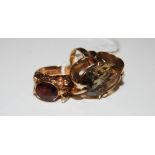 TWO 1970'S 9CT GOLD DRESS RINGS TO INCLUDE ONE SET WITH OVAL FACET CUT CITRINE, THE OTHER WITH