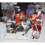 GROUP OF SIX PORCELAIN MILITARY TYPE FIGURES, TWO ON HORSEBACK AND FOUR STANDING