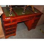 A 20TH CENTURY REPRODUCTION YEW WOOD PEDESTAL DESK WITH FOUR SHORT DRAWERS TO ONE SIDE AND A
