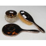 BIRMINGHAM SILVER AND TORTOISESHELL THREE-PIECE DRESSING TABLE SET COMPRISING HAND-HELD MIRROR,