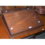 A 19TH CENTURY MAHOGANY TABLE TOP DESK WITH HINGED SLOPE FRONT